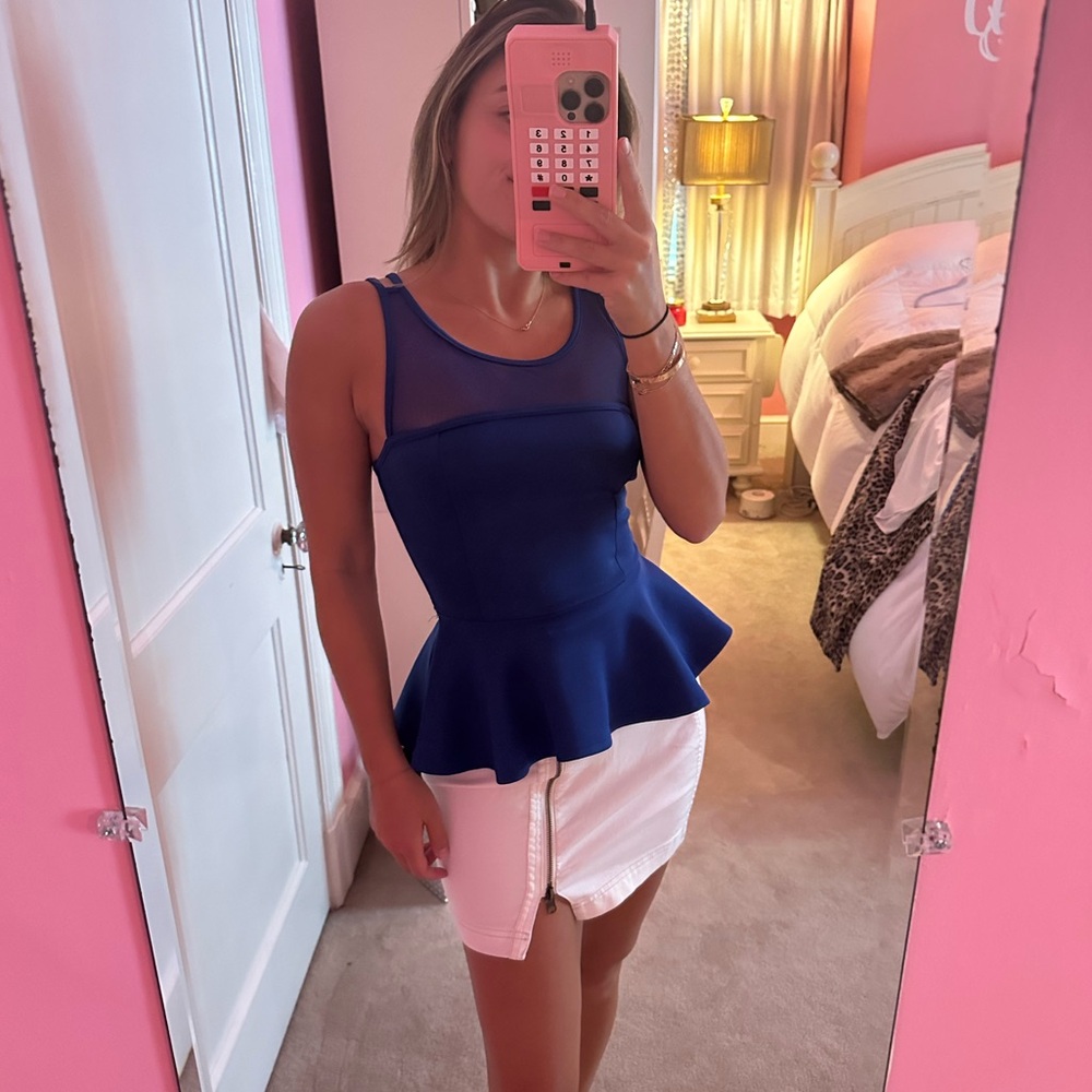Peplum top with sheer and strappy back